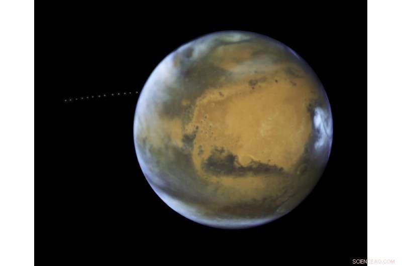 Hubble Captures Phobos Orbiting Mars in Stunning Time‑Lapse