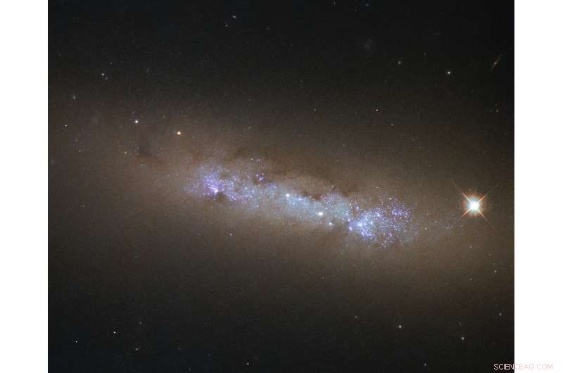 Hubble’s Cosmic Atlas: Stunning Image of Spiral Galaxy NGC 4248