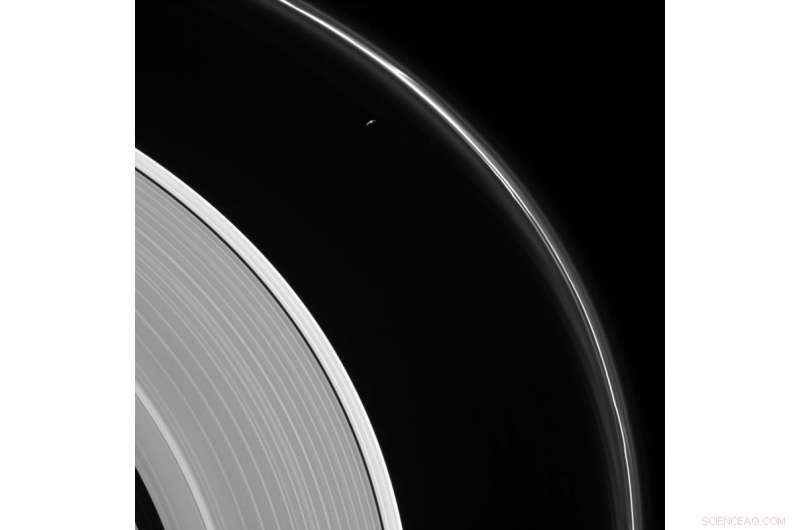 Prometheus Near Saturn’s Ghostly F Ring: Cassini’s Stunning Image