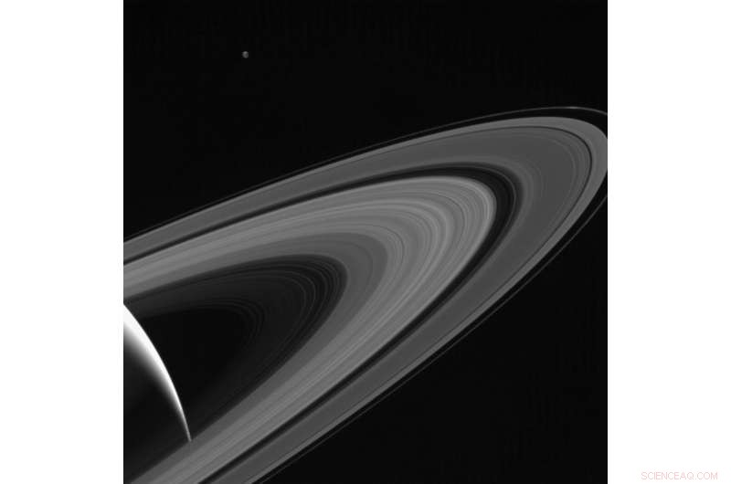Saturn’s Reflected Glow Illuminates Tethys: Cassini’s Stunning Capture