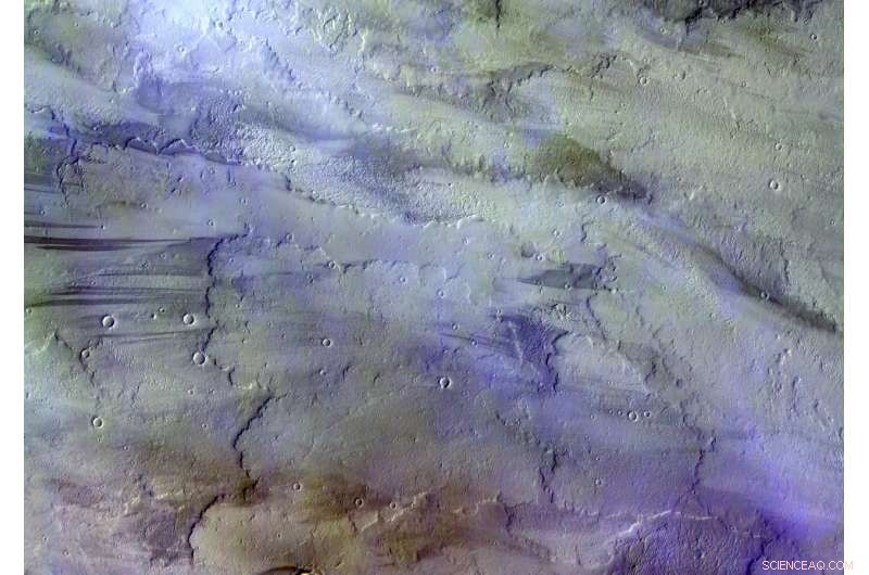 ExoMars Tr Image: Water‑Ice Clouds Over Tharsis Lava Flows on Mars