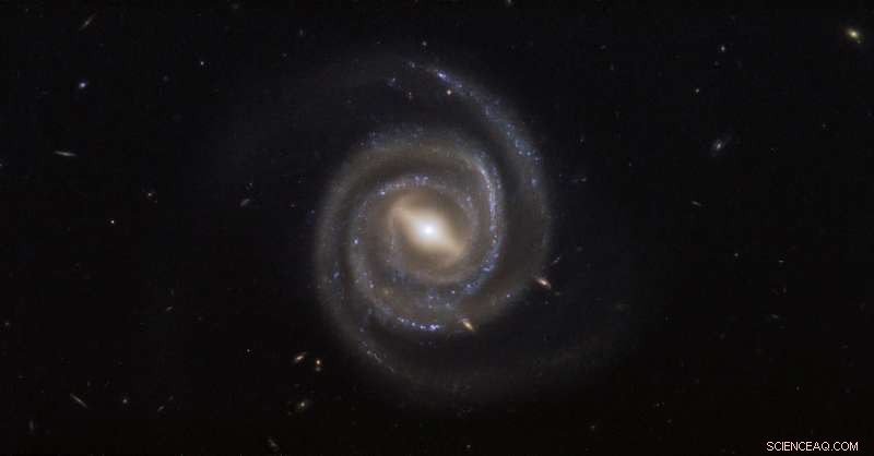 Hubble Reveals Stunning Barred Spiral Galaxy UGC 6093