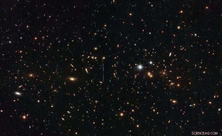 Hubble Telescope Measures Mass of Galaxy Cluster at Three Million Billion Suns
