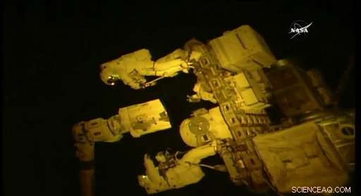 ISS Astronauts Equip Robot Arm with New Manipulator During Spacewalk