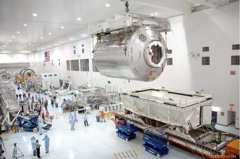 Columbus Module Moves onto Kennedy Space Center Cleanroom Work Stand