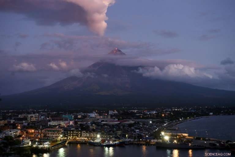 Supermoon Lights Up Mount Mayon During Eruption, Capturing Global Awe