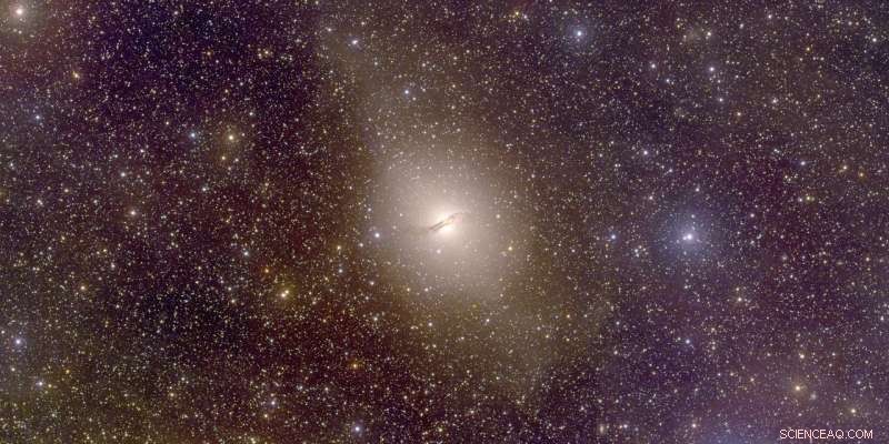 Unexpected Disk‑Like Satellite Arrangement in Distant Galaxy Group Challenges Dark Matter Models