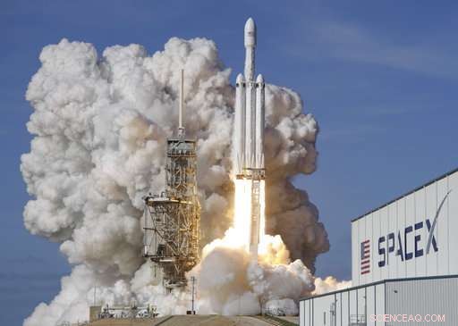 SpaceX’s Red Tesla Sports Car Launches Toward the Asteroid Belt Beyond Mars