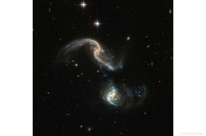 Arp 256: Witness the Stunning Early-Stage Galactic Merger