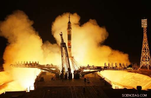 Three Astronauts Dock at the International Space Station: Two Americans and One Russian