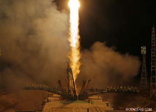 Three Astronauts Dock at the International Space Station: Two Americans and One Russian