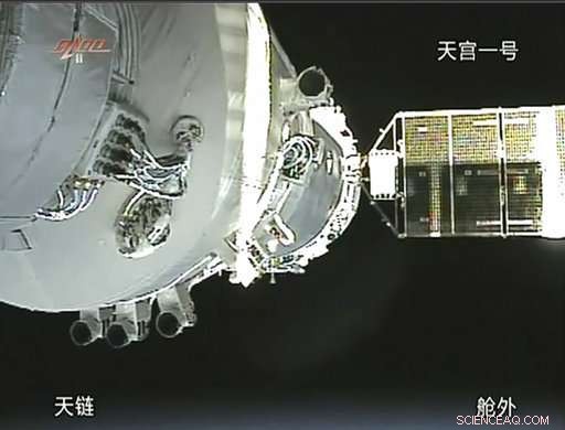 China s Retired Tiangong-1 Space Lab Heads for Earth Re-Entry