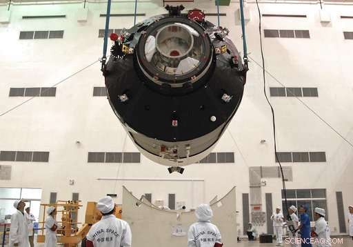 China s Retired Tiangong-1 Space Lab Heads for Earth Re-Entry