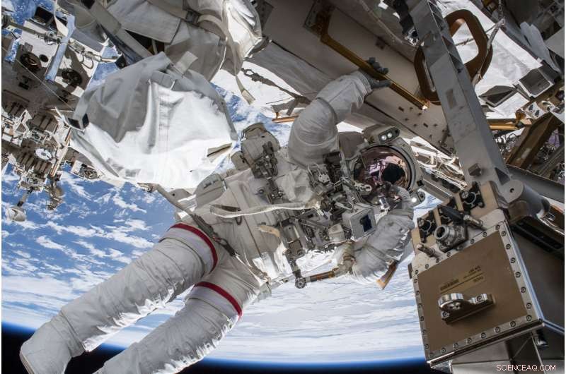 NASA Astronaut Drew Feustel Conducts Spacewalk Near ISS