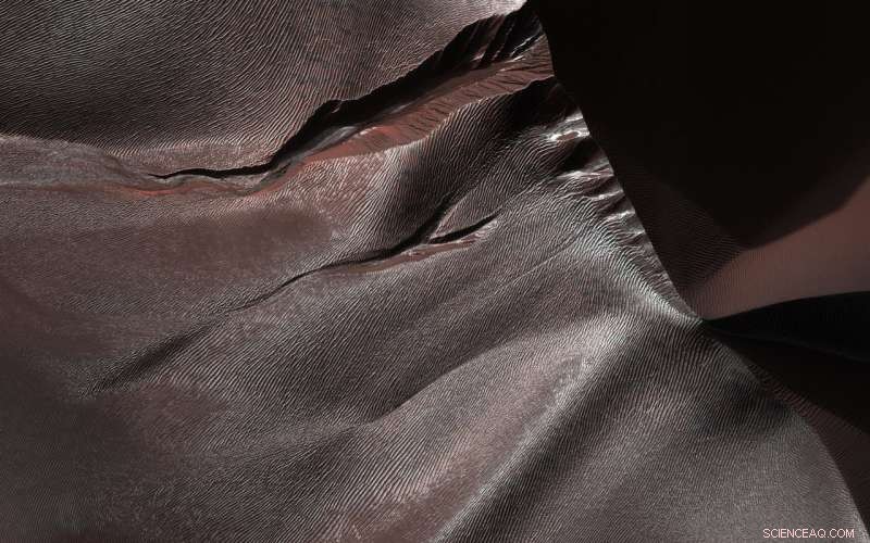 Photographic Insight: Gullies on Martian Dunes in Matara Crater