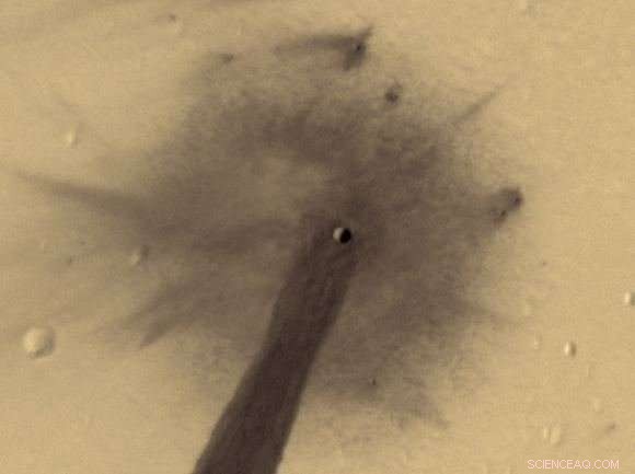 Meteoroid Impact on Martian Crater Triggers Unexpected Landslide
