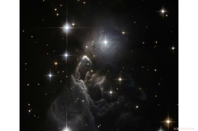 Hubble Captures Mysterious Cloud IRAS 05437+2502 in Taurus