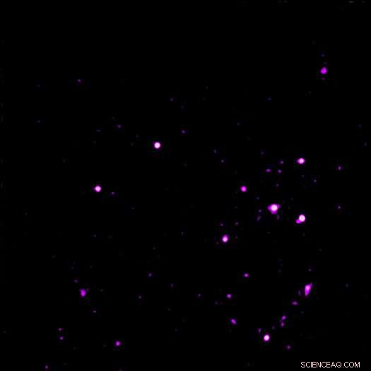 Chandra Discovers Black Hole Ring Formed by Galactic Collision