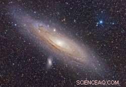 Discovering a Hidden Dwarf Galaxy Behind Andromeda