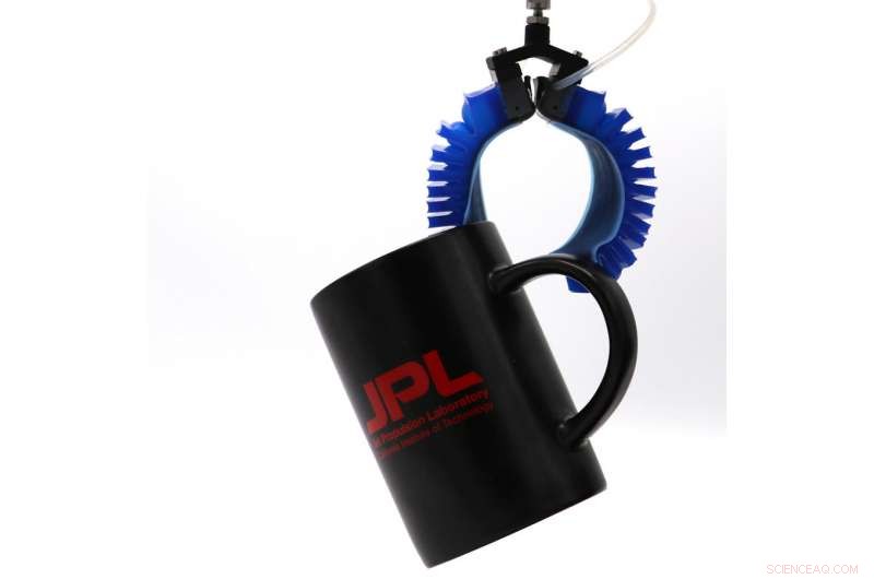 Gecko-Style Adhesives Enhance Soft Robotic Grippers for Superior Grip