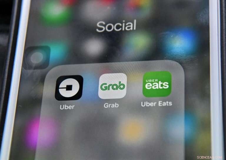 Singapore Halts Uber-Grab Merger Amid Regulatory Review