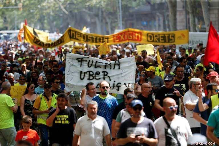 Uber and Cabify Suspend Barcelona Operations After Drivers Are Attacked During Taxi Strike