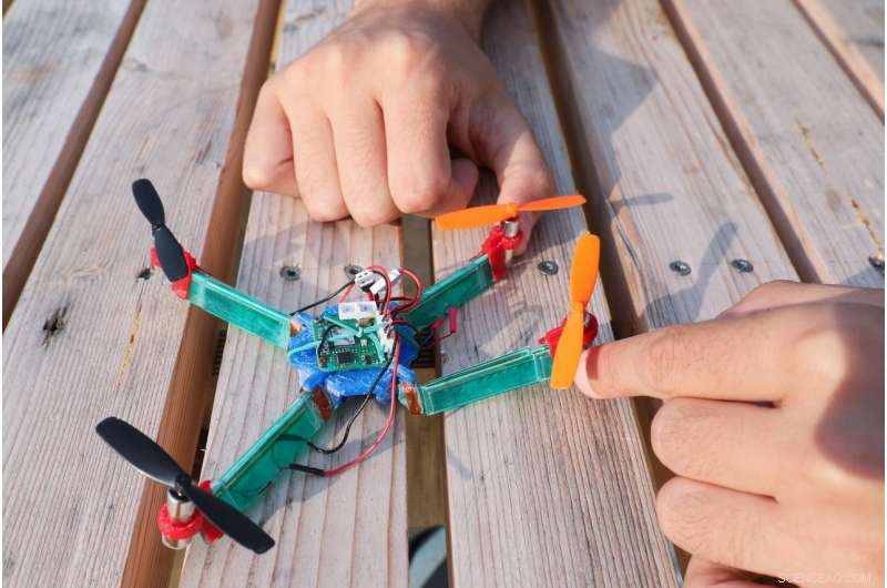 Insect-Inspired Drone Resilient to Impact Through Smart Layering