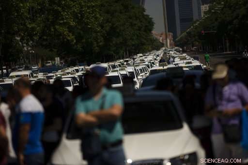 Spain s Taxi Drivers Block Streets Over Ride-Hailing Services