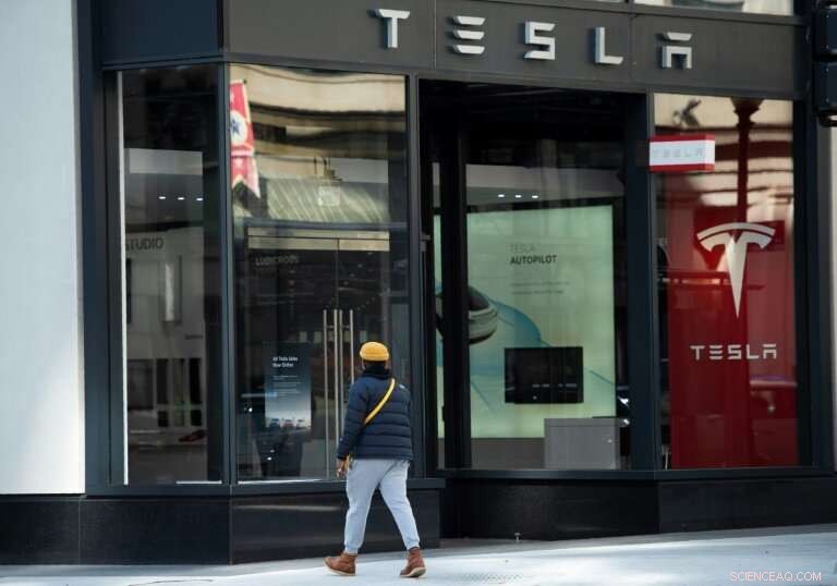 Tesla Reverses Online-Only Strategy, Keeps Showrooms Open for In-Person Shopping