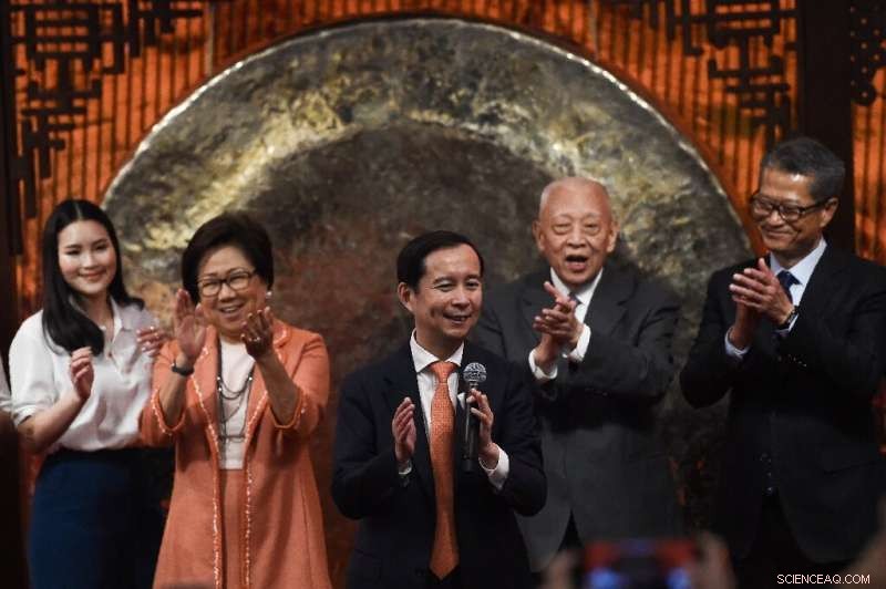 Alibaba Shares Surge After Successful Hong Kong Listing