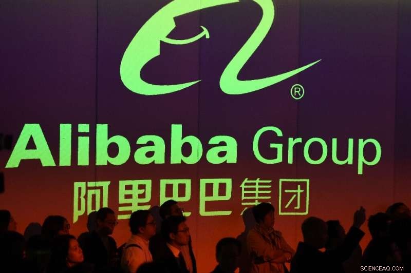 Alibaba Shares Surge After Successful Hong Kong Listing