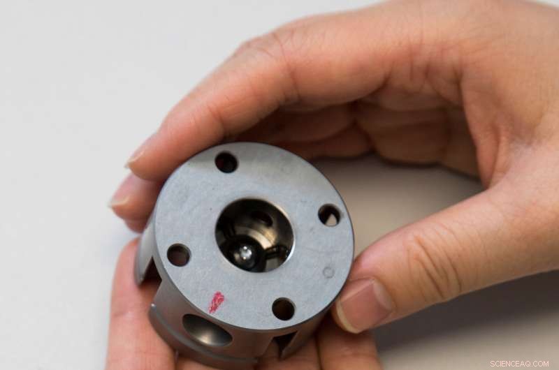 Tiny Diamond Anvils Trigger Chemical Reactions by Applying Pressure