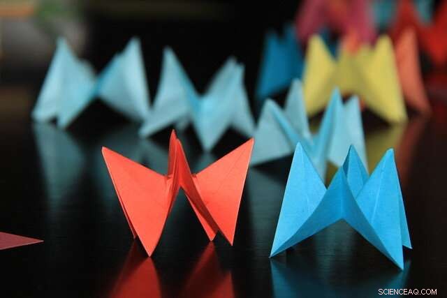 Kirigami-Driven Terahertz Light Spinning Delivers Real-Time Imaging of Biological Tissue