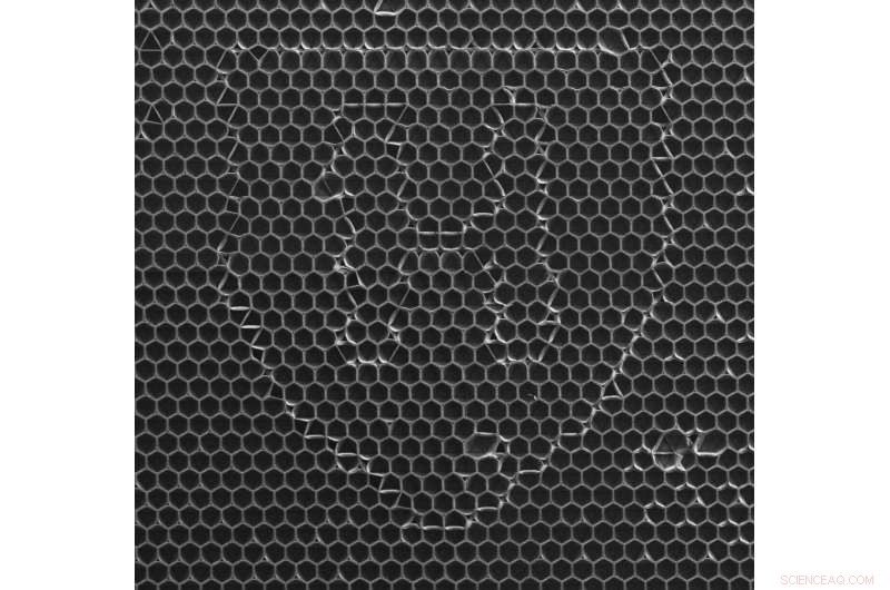 Reconfiguring Material Topology: Turning Circles into Squares at the Microscale