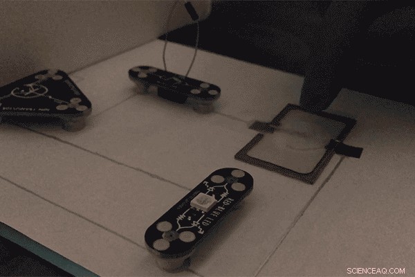 Engineered Bacteria Assemble Functional Devices Using Gold Nanoparticles