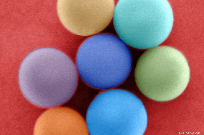 Nanoresonator Glass-Bead Coating Enhances Solar Cell Efficiency