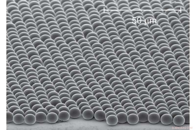 Silica Microspheres that Self‑Assemble to Passively Cool Surfaces Without Energy Input