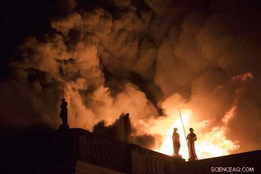 Firefighters battle to preserve priceless artifacts as Rio s National Museum burns