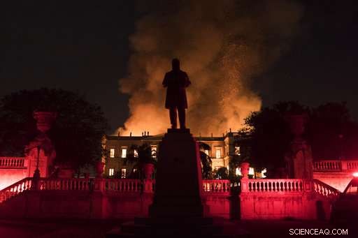 Firefighters battle to preserve priceless artifacts as Rio s National Museum burns