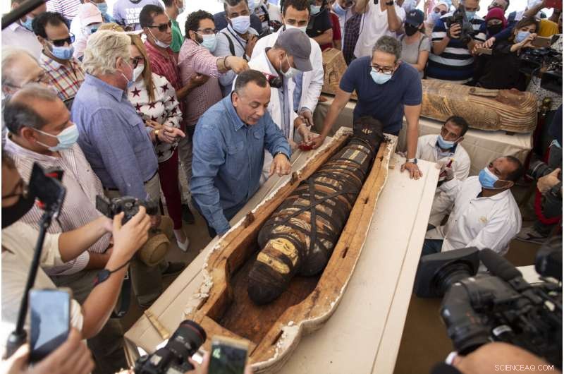 Egypt’s Archaeologists Unveil 59 Ancient Coffins Near Saqqara Pyramids