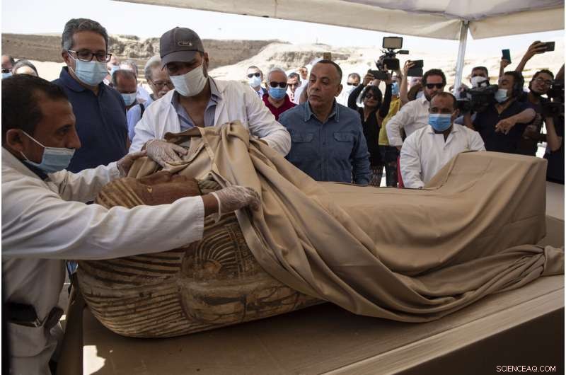 Egypt’s Archaeologists Unveil 59 Ancient Coffins Near Saqqara Pyramids
