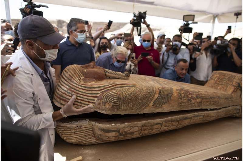 Egypt’s Archaeologists Unveil 59 Ancient Coffins Near Saqqara Pyramids