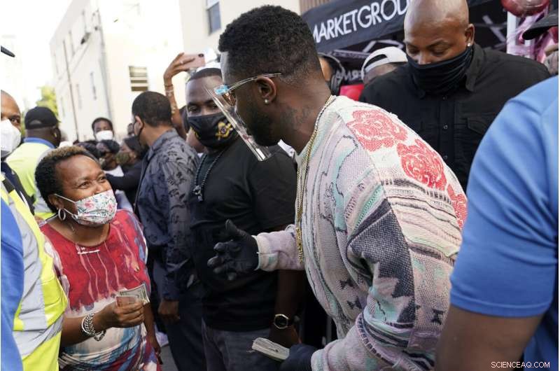 Diddy Delivers COVID-19 Relief and Essentials to Miami s Overtown Neighborhood