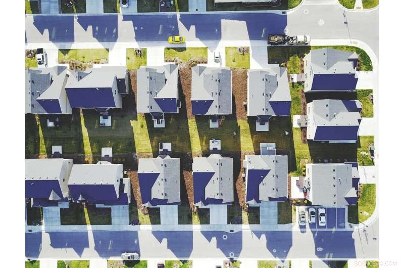 Peer Comparisons Shape How Income Influences Happiness