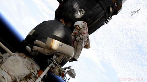 ISS Crew Investigates Mysterious Soyuz Capsule Leak During Spacewalk
