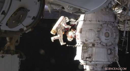 ISS Crew Investigates Mysterious Soyuz Capsule Leak During Spacewalk
