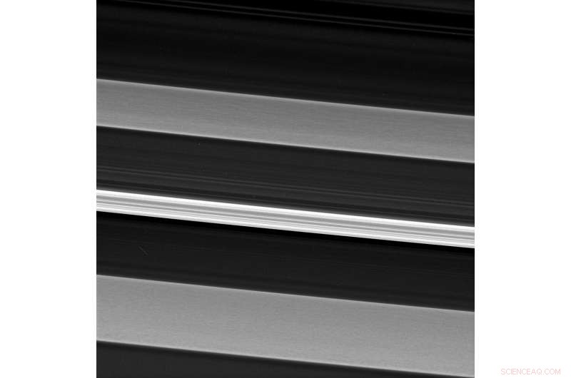 Precise Measurement of Saturn’s Rotation Rate Achieved Through Ring Wave Analysis