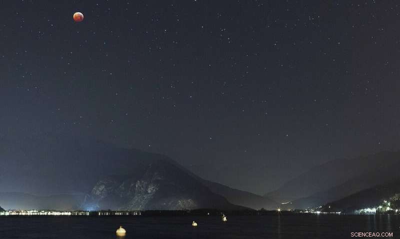 Stunning Lunar Eclipse Over Lake Maggiore: A Celestial Showcase