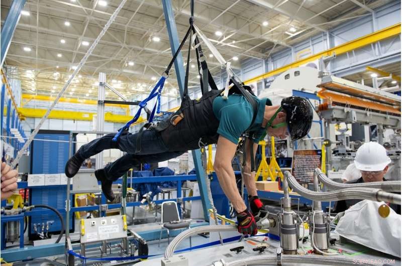 ESA Astronaut Prepares for AMS-02 Repair Using Partial Gravity Simulator