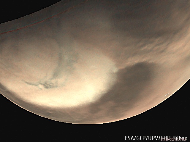 Mars Express Captures Dust Storm Swirling Over North Polar Ice Cap